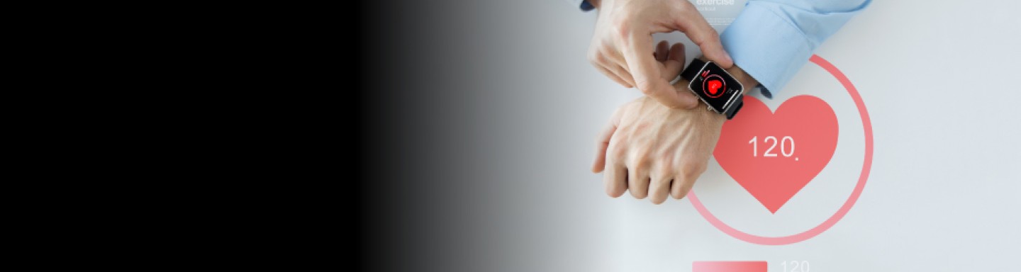 Bird eye view of someone clicking on their wearable device; heart monitor visual